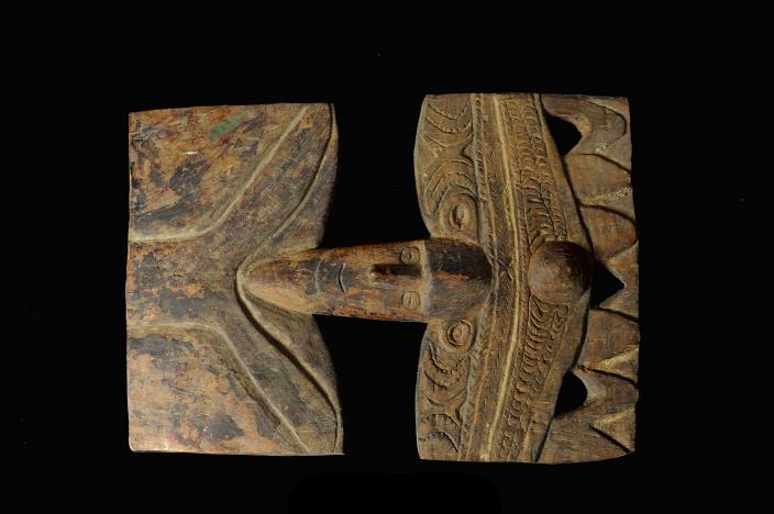Hard wood plaque from the Middle Sepik region. Front View.